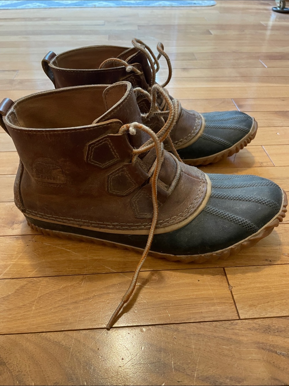 Sorel women’s Brown Leather and Black Rubber Lace-Up Duck Boots